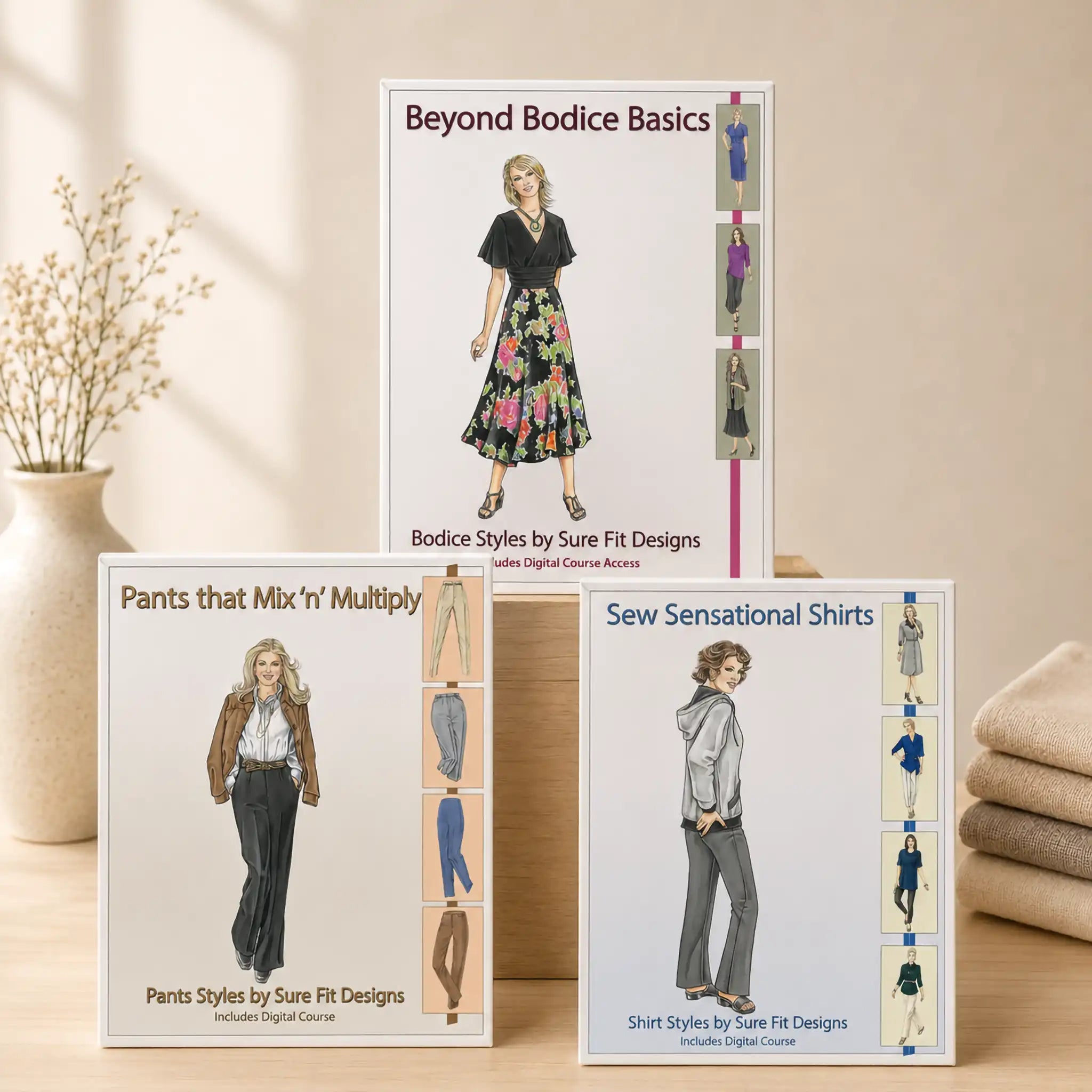 A collection of designing books for bodice, shirt and pants displayed on a light maple table